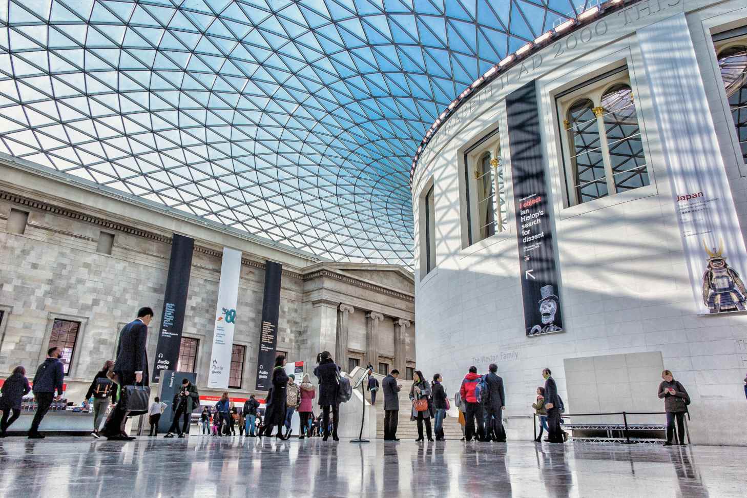 People walking around the Great Court of the British Museum, London