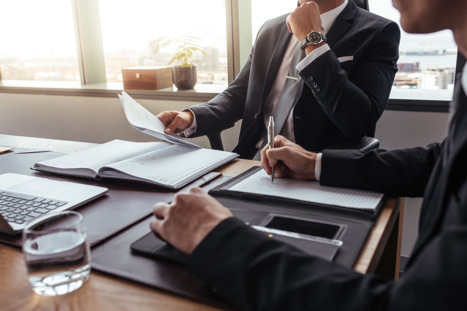 A team of two lawyers working together in an office