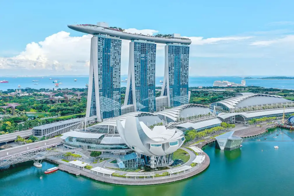 Aerial panorama of the Marina Bay Sands resort and the Gardens by the Bay nature park in the Central Region of Singapore